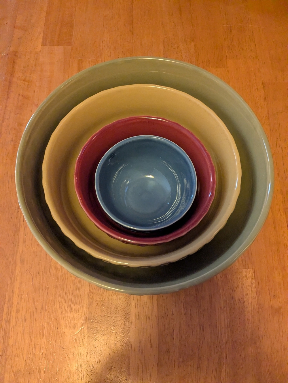 Stacked Ceramic Mixing Bowls in Sage, Mustard, Burgundy & Blue